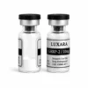Two Luxara Labs GHRP-2 10mg research peptide vials with black caps on a white background