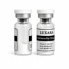 Two Luxara Labs Sermorelin 10mg research peptide vials with white caps on a white background